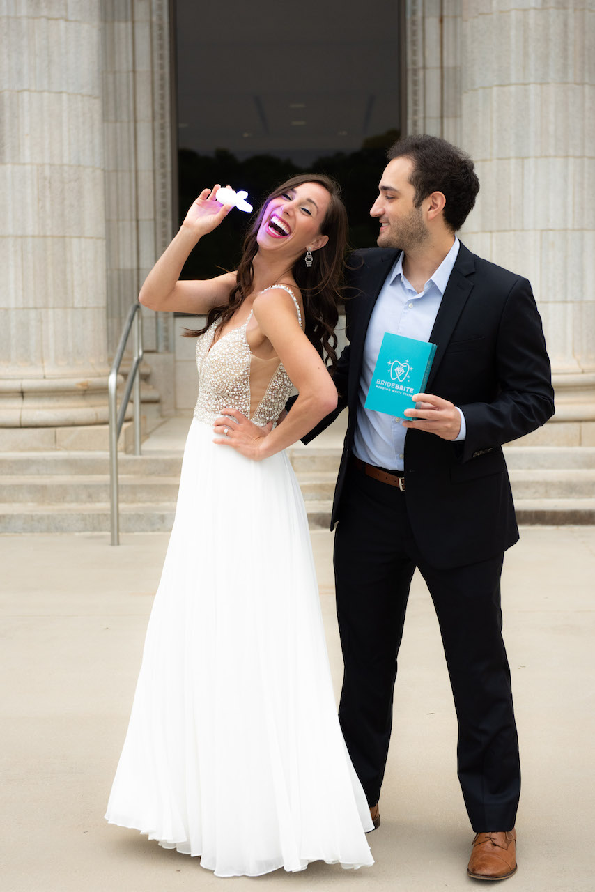 bride and groom with teeth whitening kit