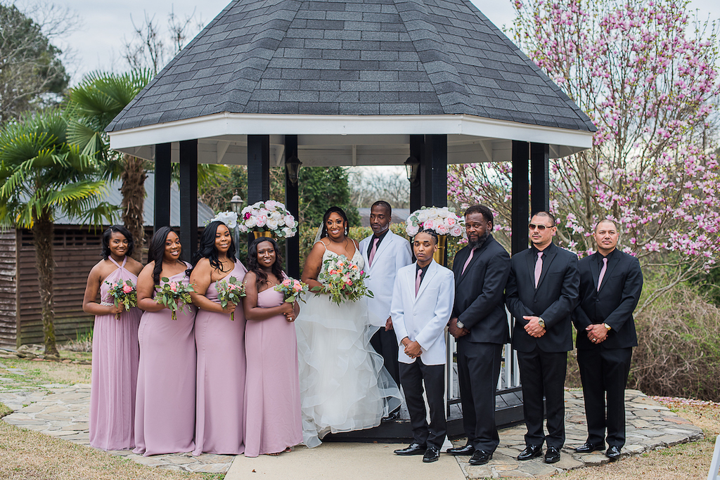 outdoor fairytale wedding bridal party