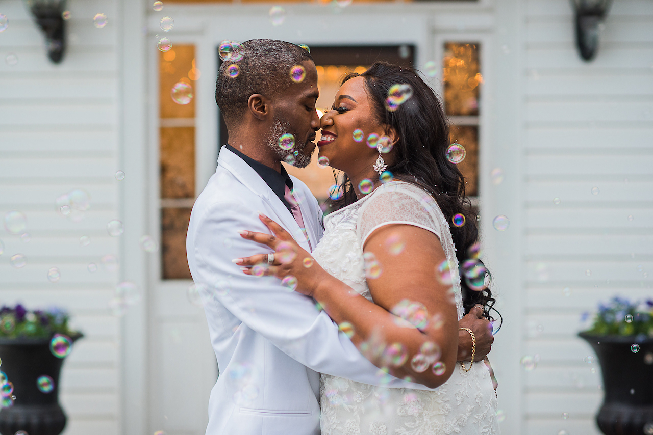 bride and groom embracing