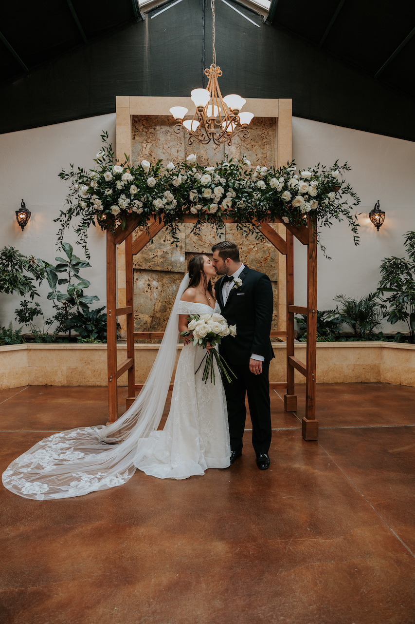 bride and groom kissing