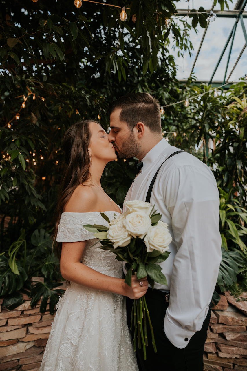 bride and groom kissing