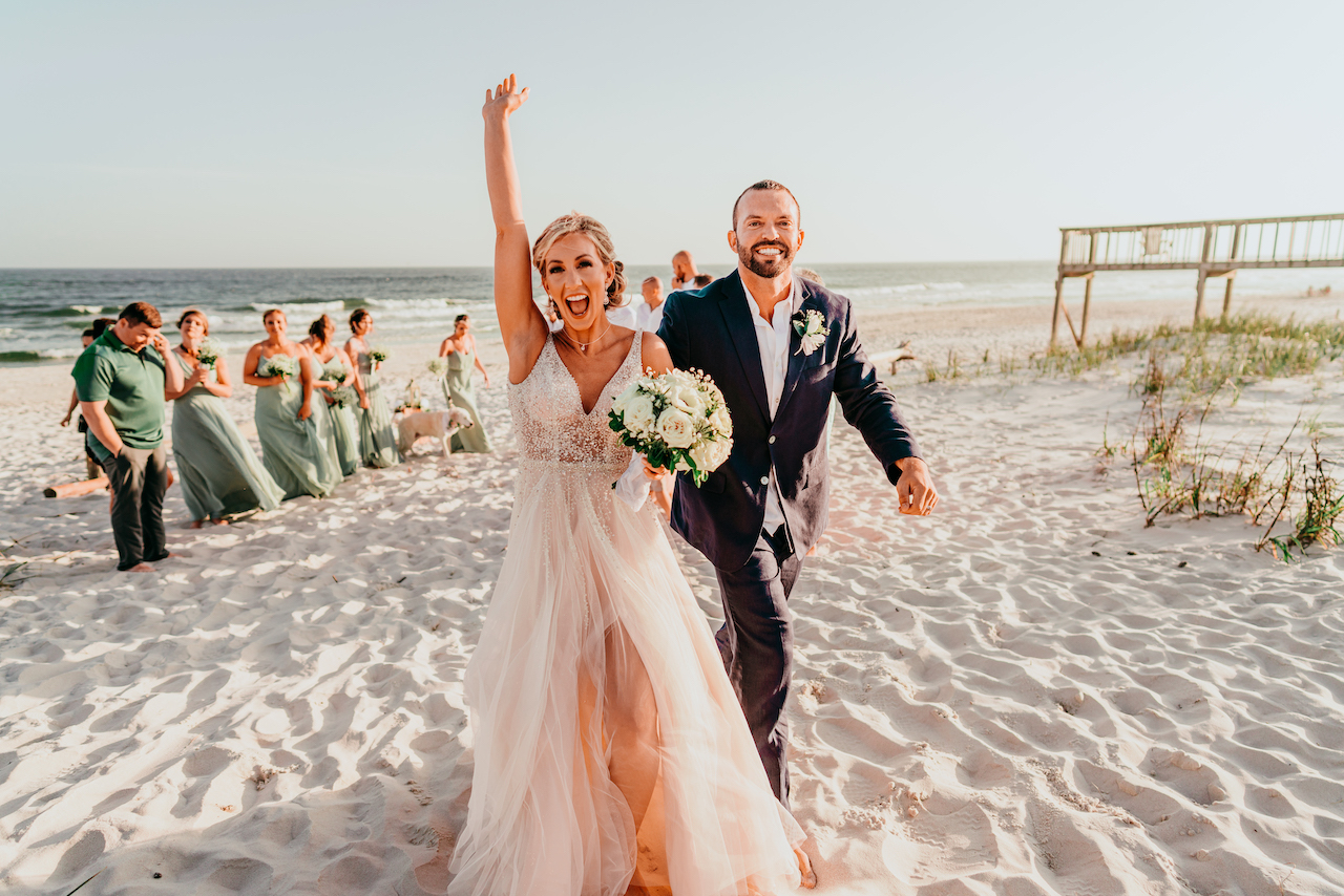 bride and groom at their romantic beach wedding in Alabama
