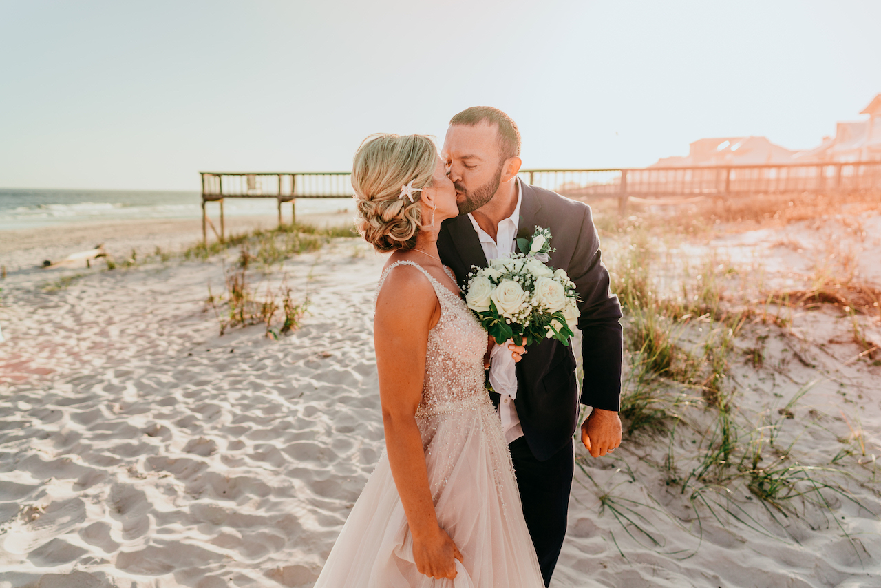 bride and groom at their romantic beach wedding in Alabama 