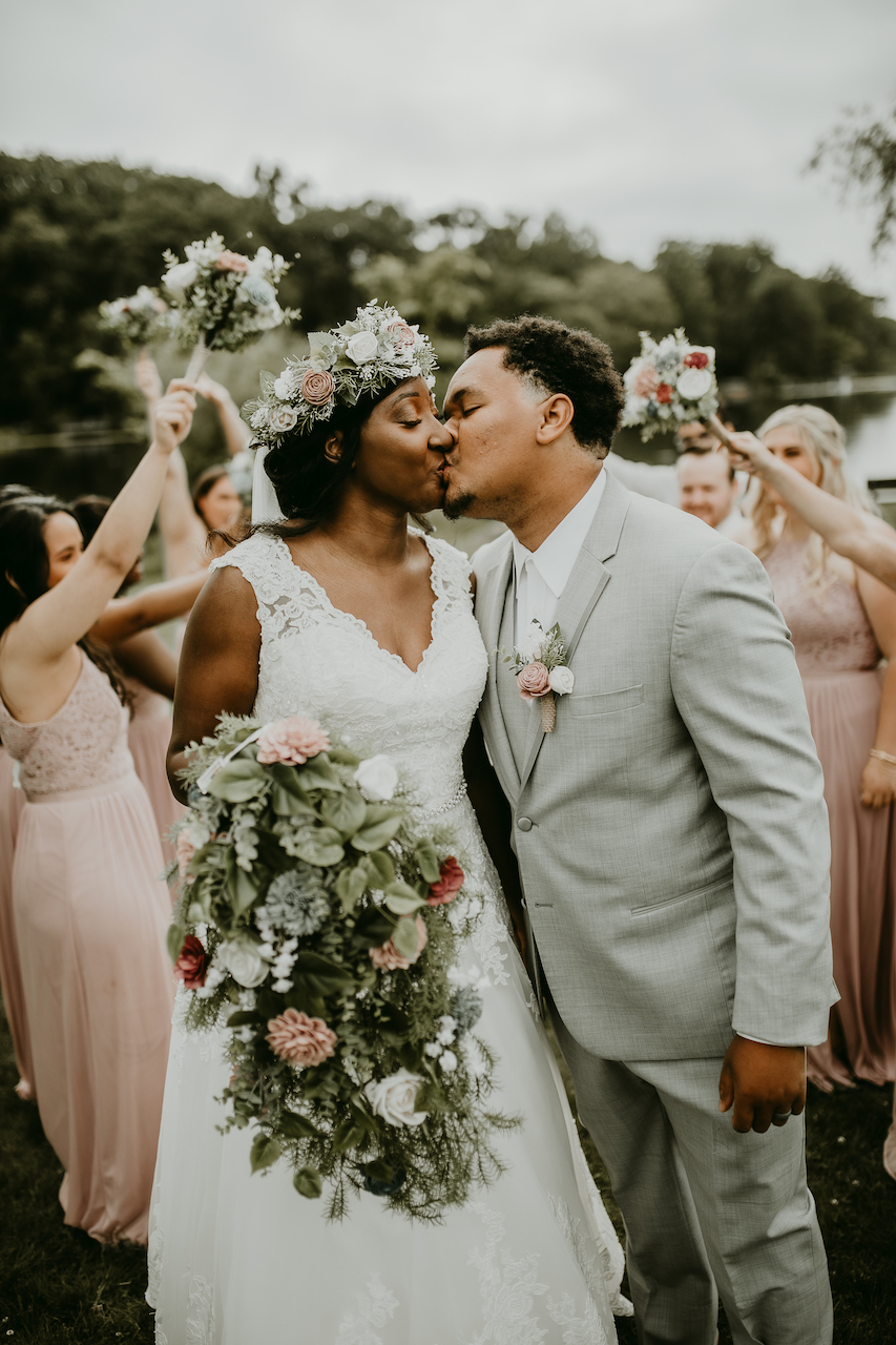 bride and groom kissing