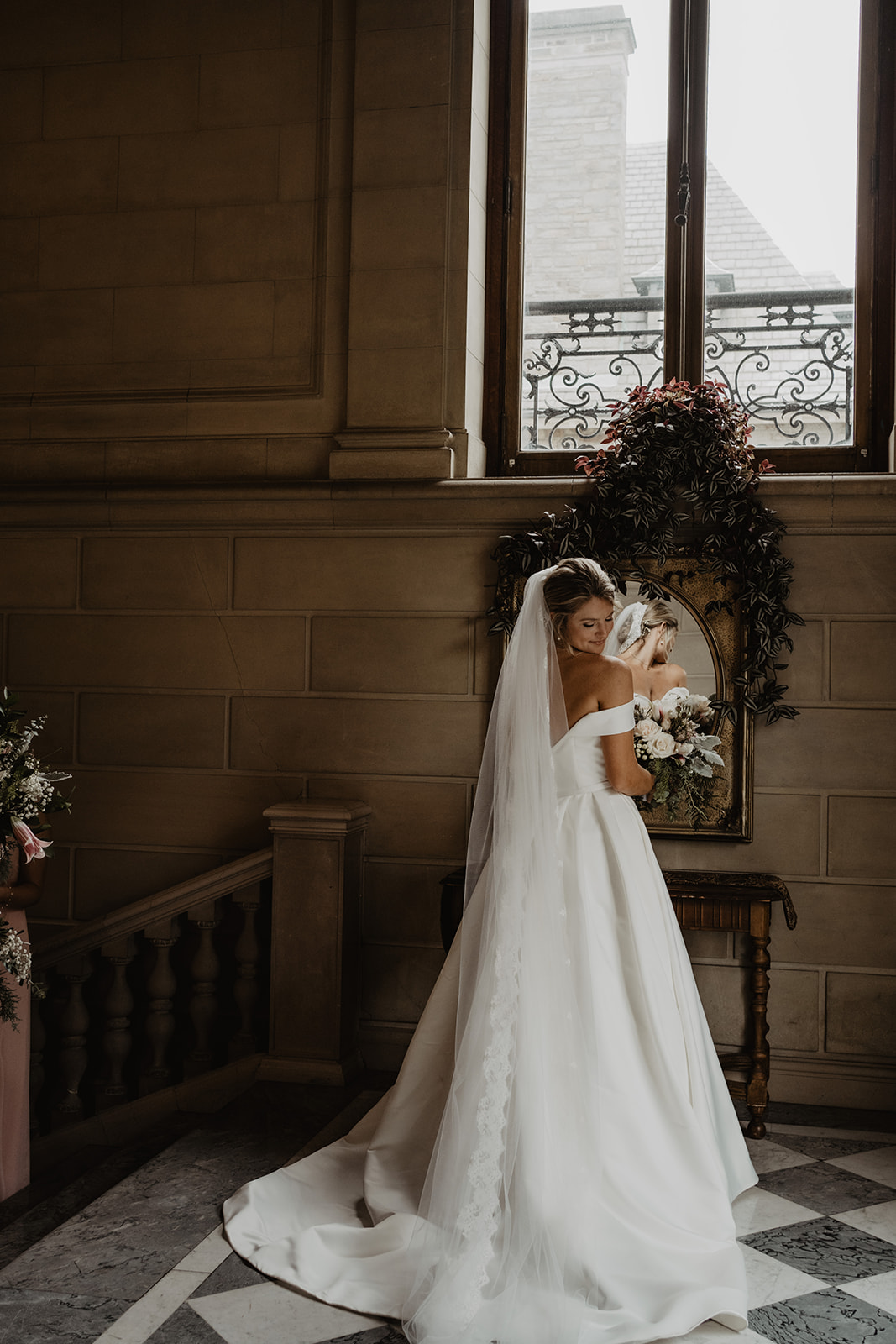 bride in mansion hallway