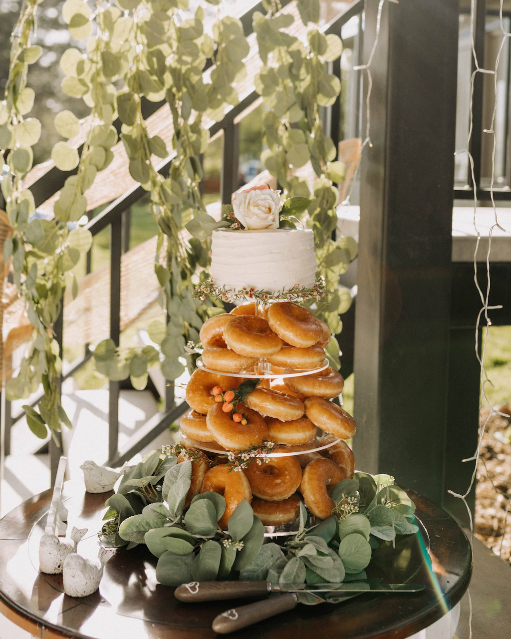 classic rustic wedding cake with donuts