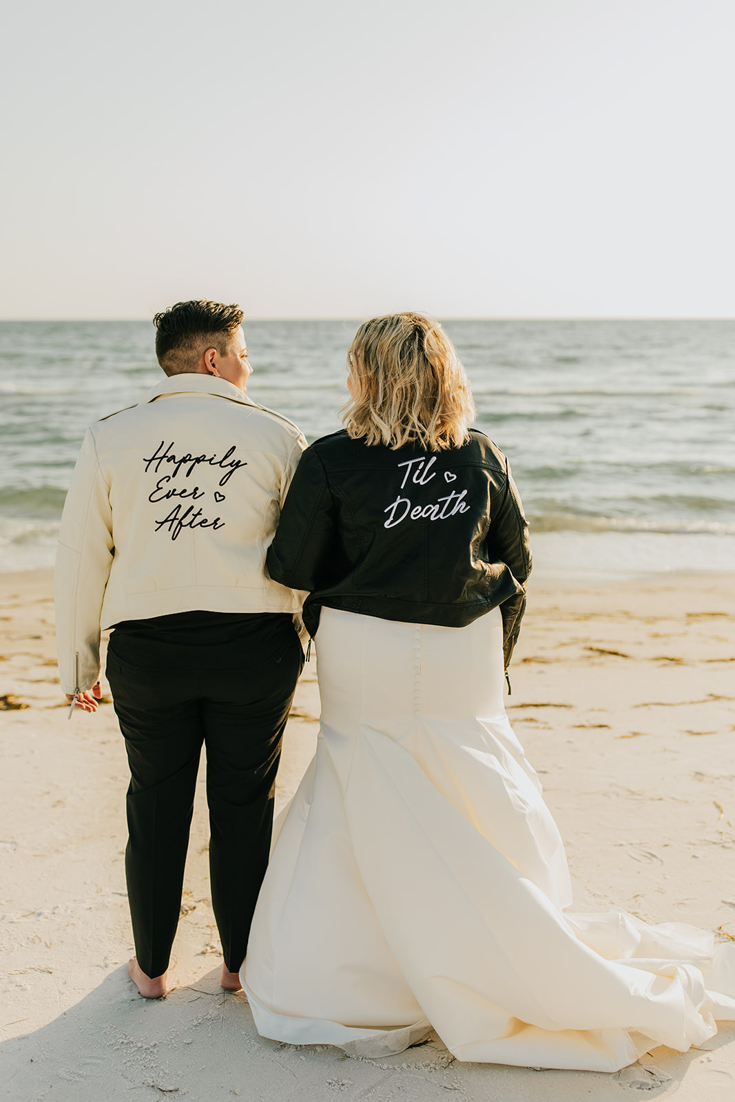 couple wearing leather jackets