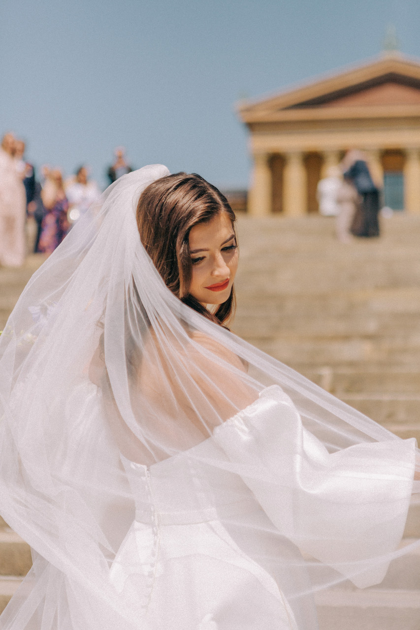 bride on the steps of philadelphia art museum 
