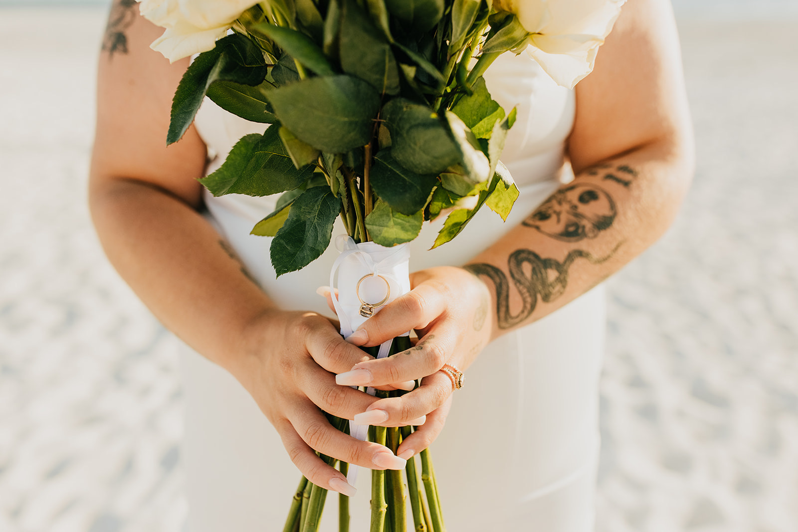 bride holding flowers