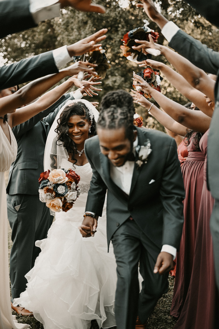 bride and groom smiling at simple and elegant fall wedding 