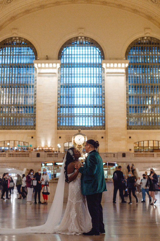 bride and groom dancing in grand central station