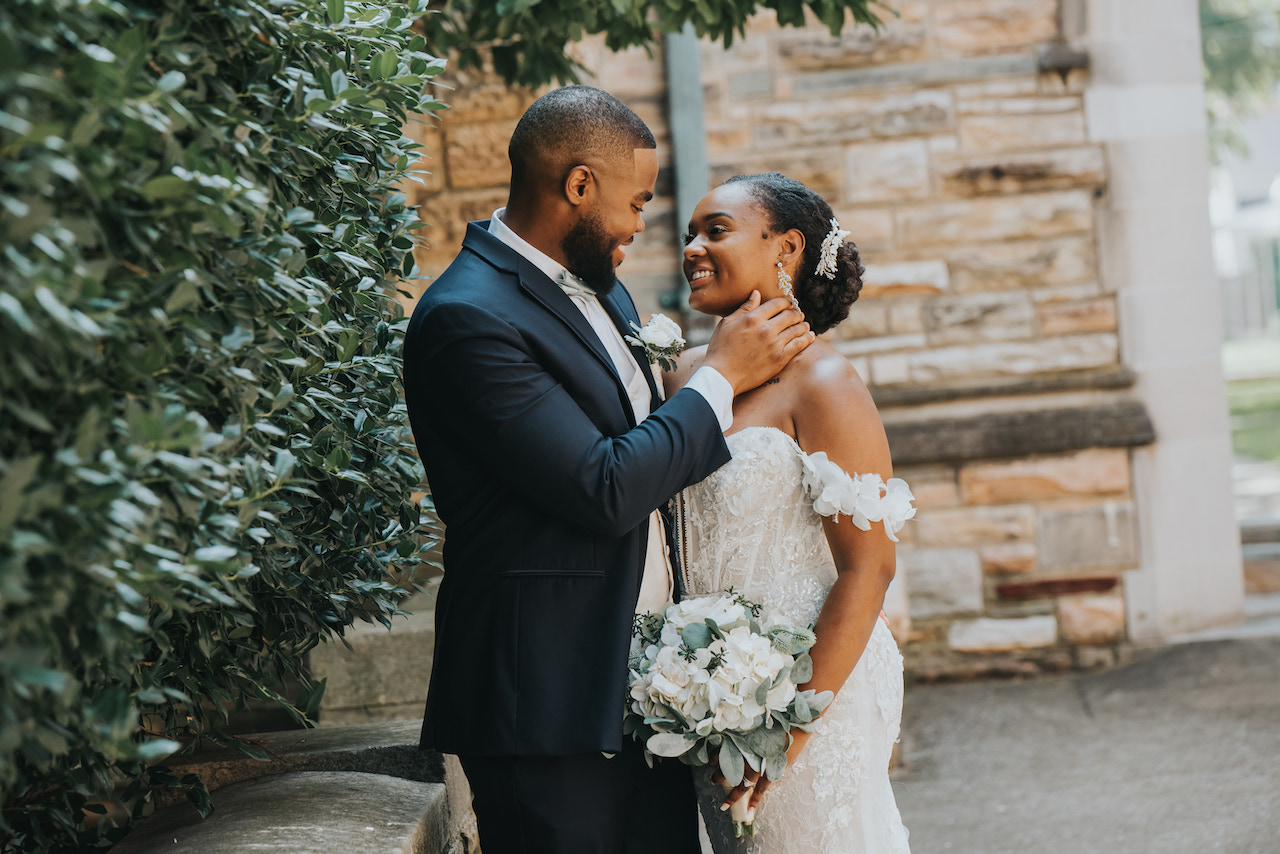 bride and groom embracing