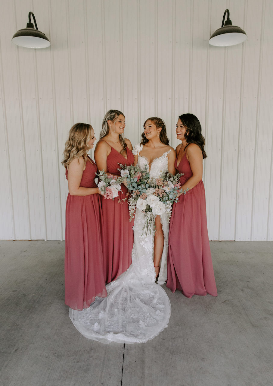 bride and bridesmaids at september ranch wedding
