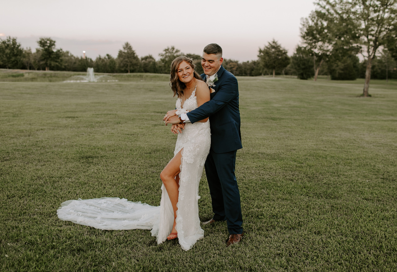 bride and groom laughing at september ranch wedding