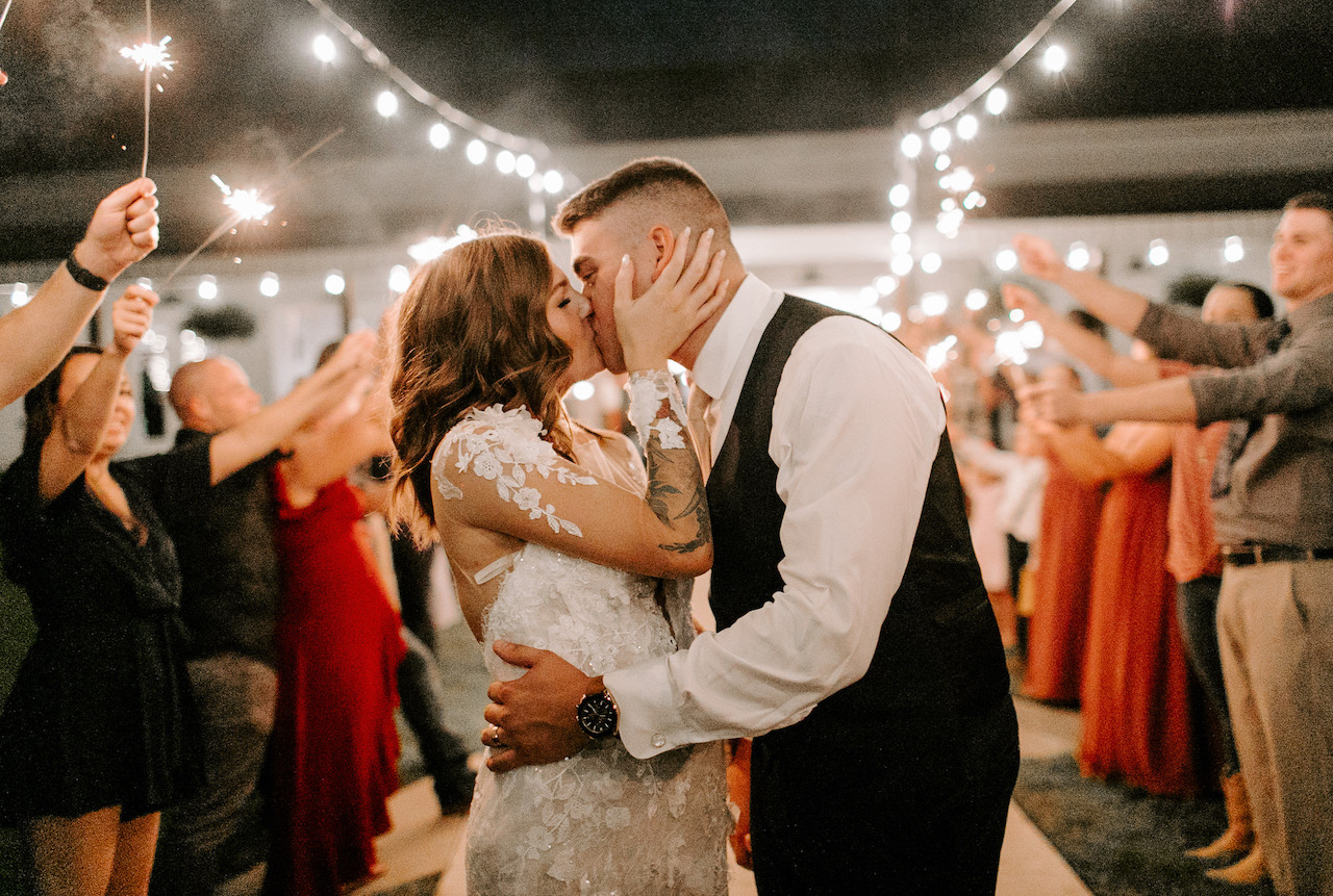 couple kissing at september ranch wedding