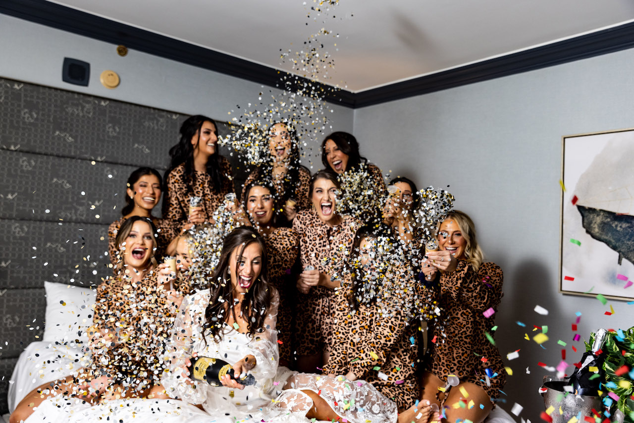 bride with bridesmaids in cheetah robes