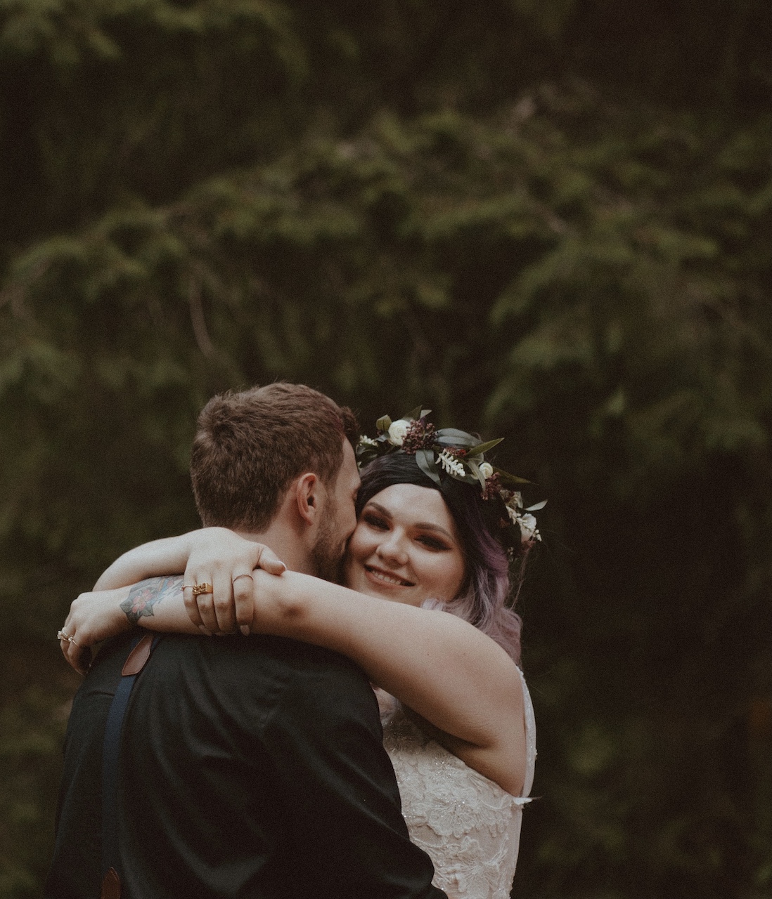 bride and groom embracing