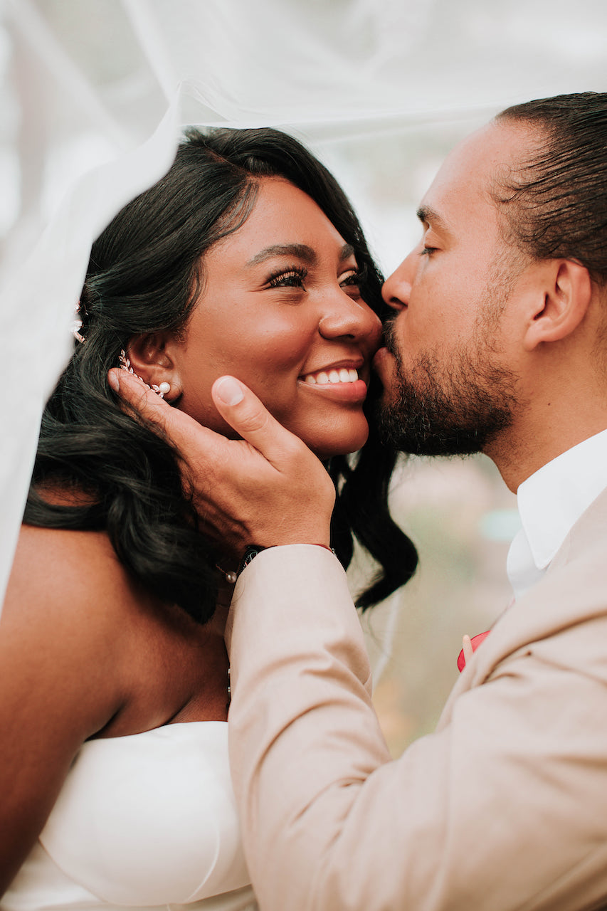 groom kissing bride 