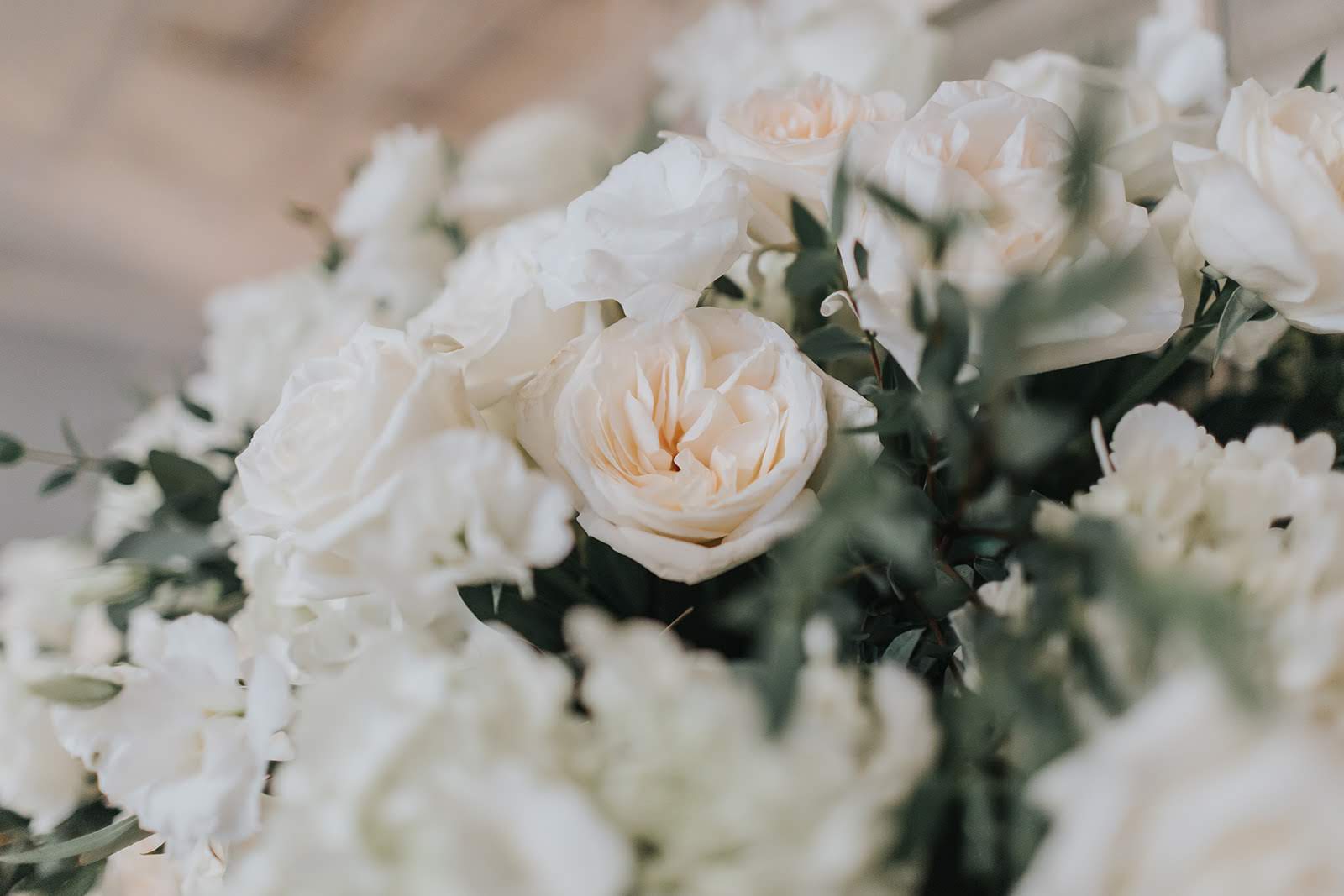 white floral bouquet with greenery
