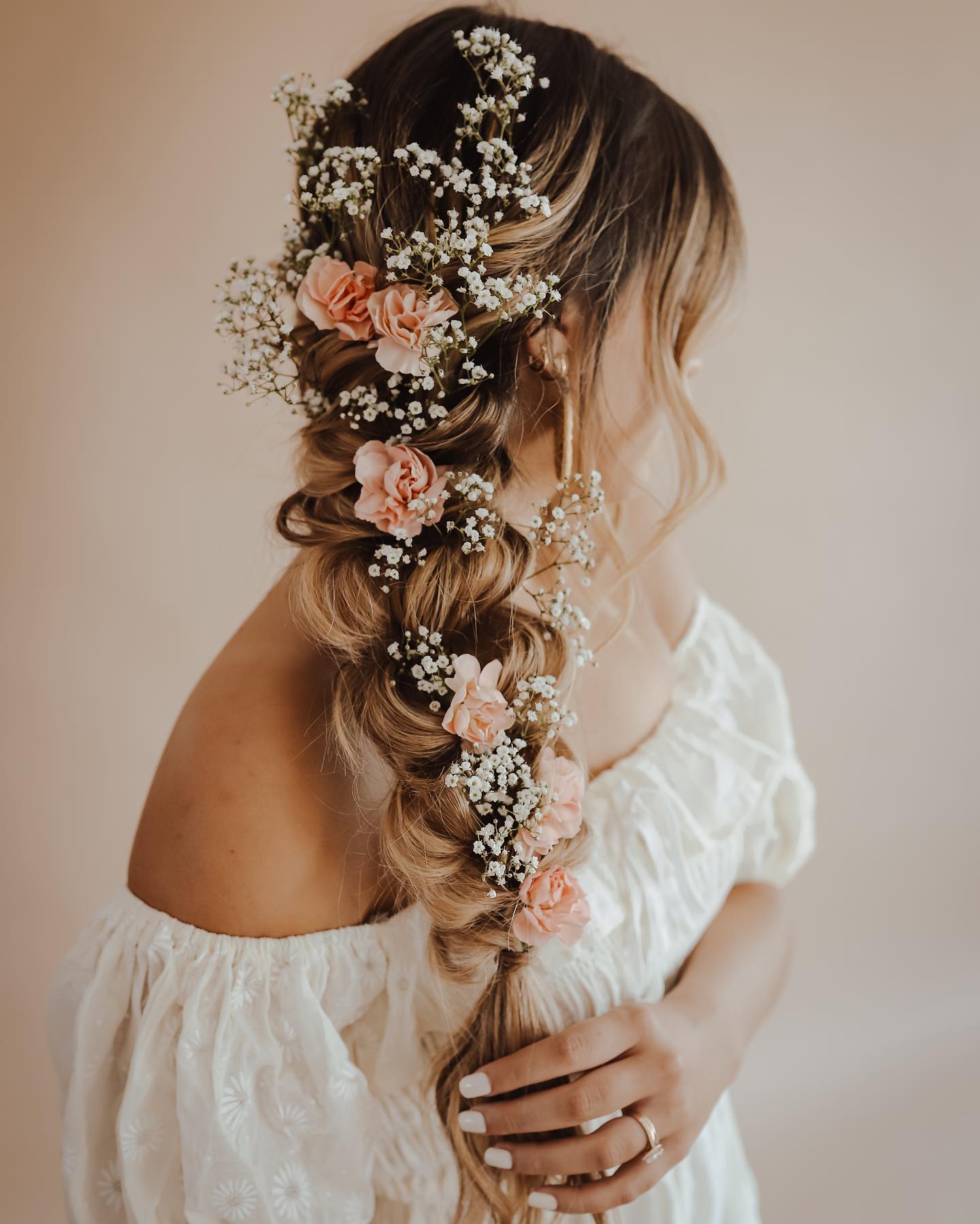 braid with pink flowers