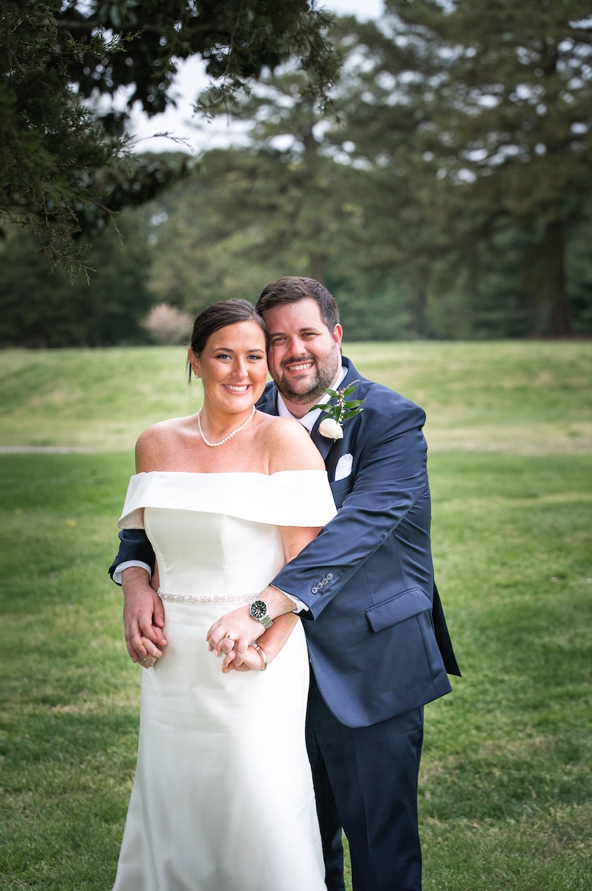 bride and groom embracing