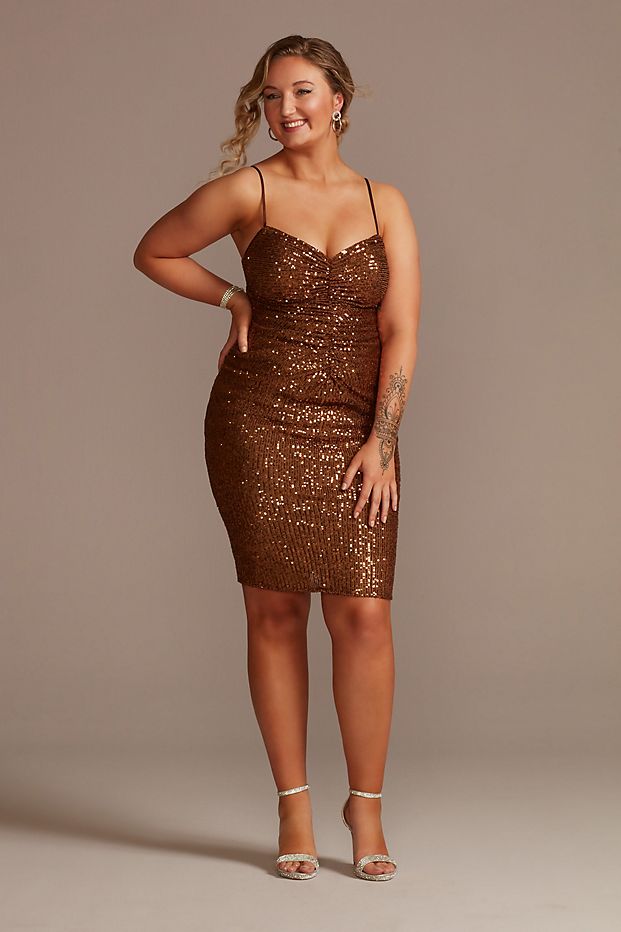 Girl wearing sparkly brown mini dress