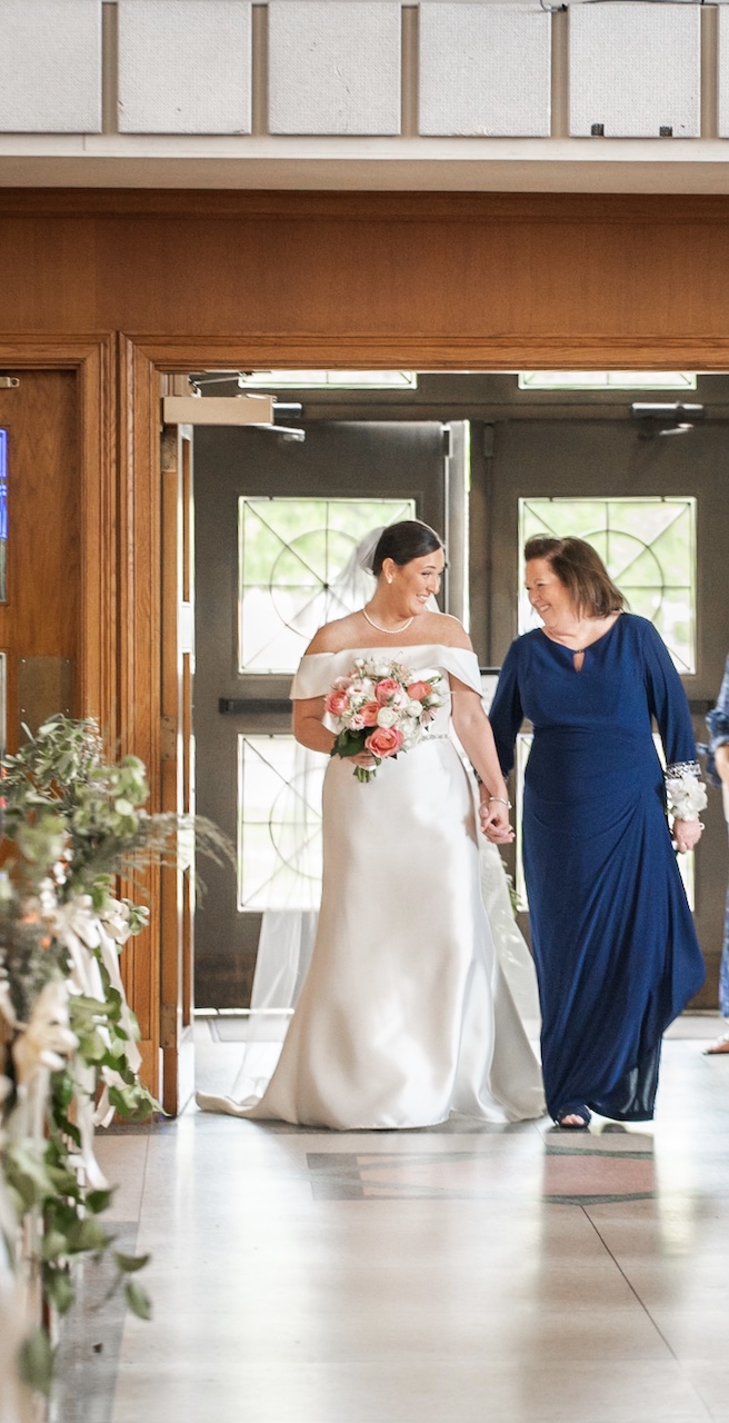 mom walking bride down the aisle at spring wedding in maryland