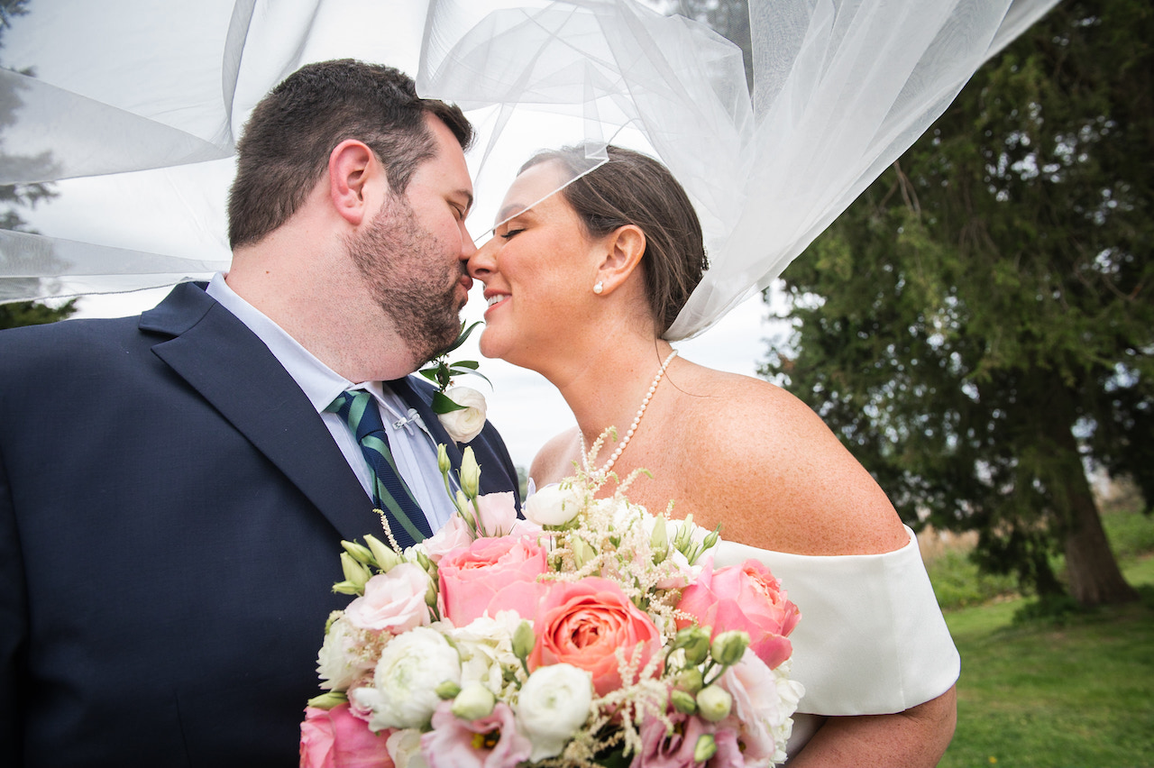 bride and groom embracing