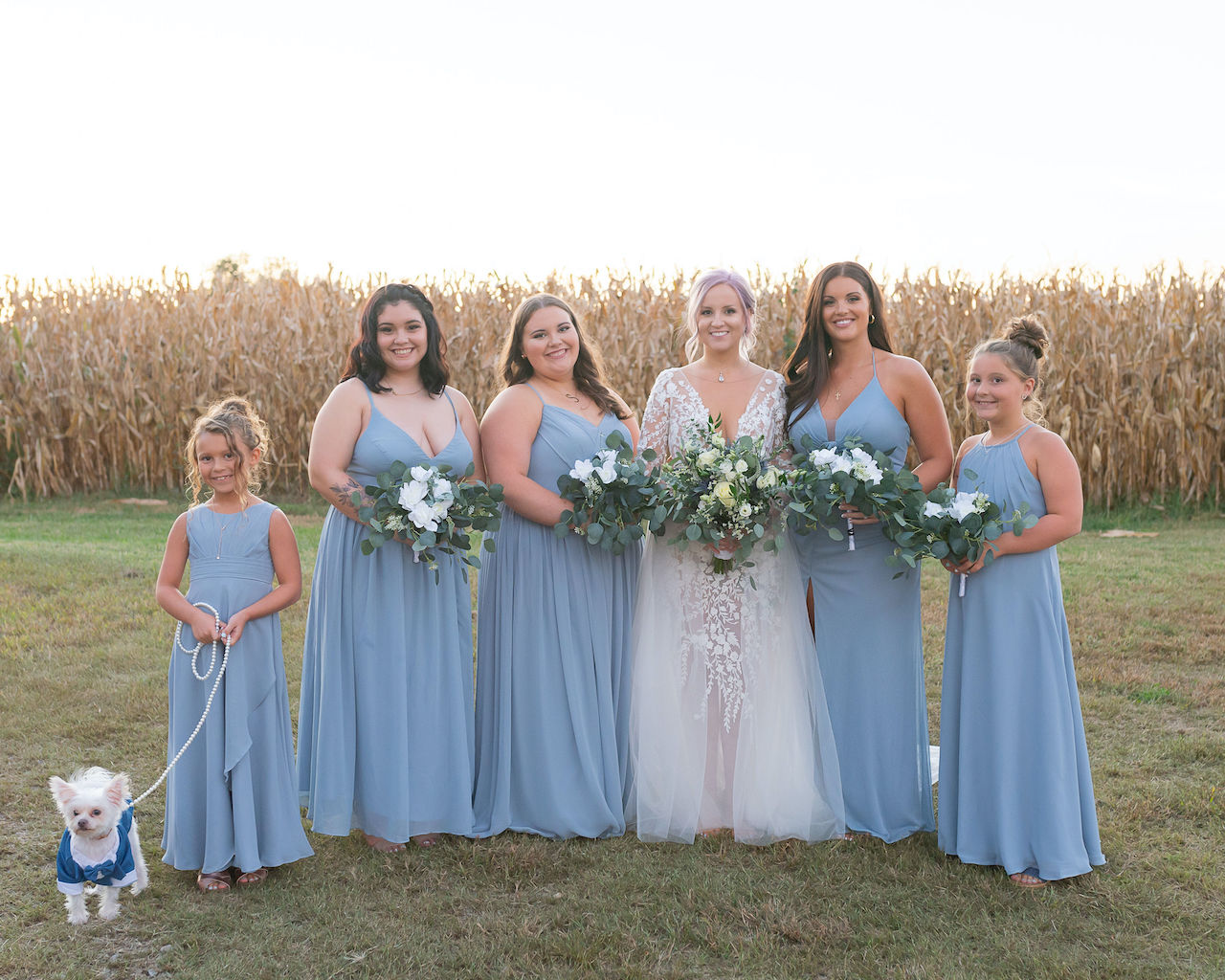 bride and bridesmaids at rustic outdoor wedding in Delaware
