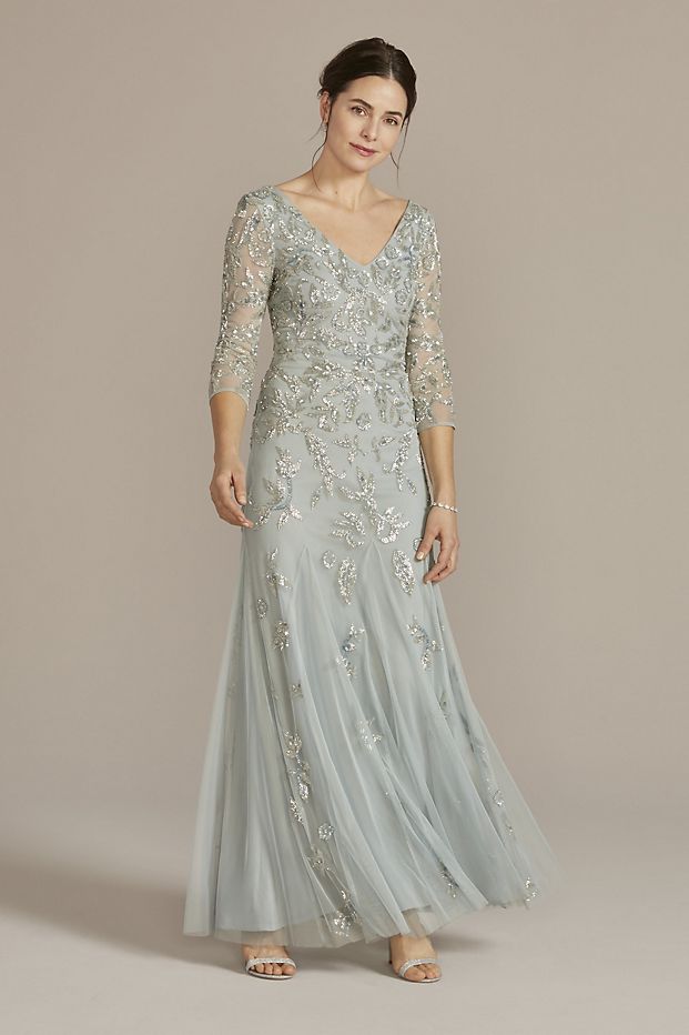 Woman wearing a light blue mother of the bride dress