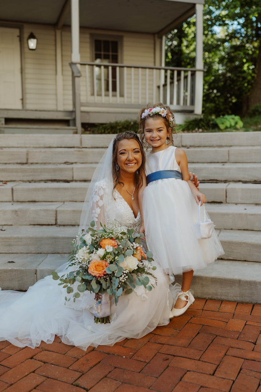 bride and flower girl at fall wedding in tennessee