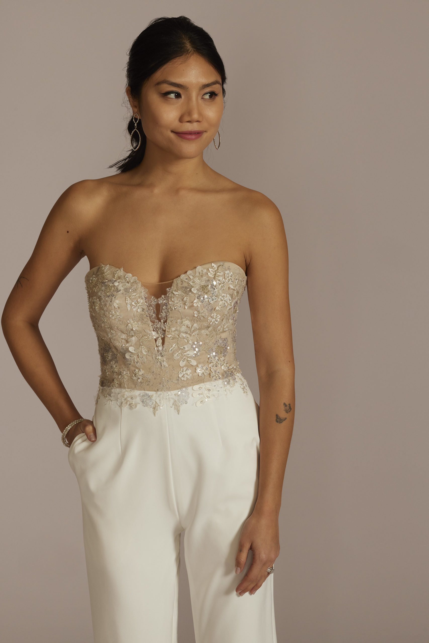 model in Strapless Beaded Floral Applique Bodice Jumpsuit 
