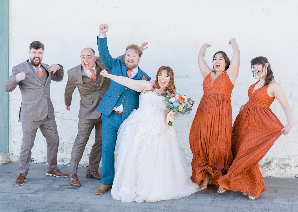 bride, groom & bridal party celebrating at Spring Wedding in Monterey