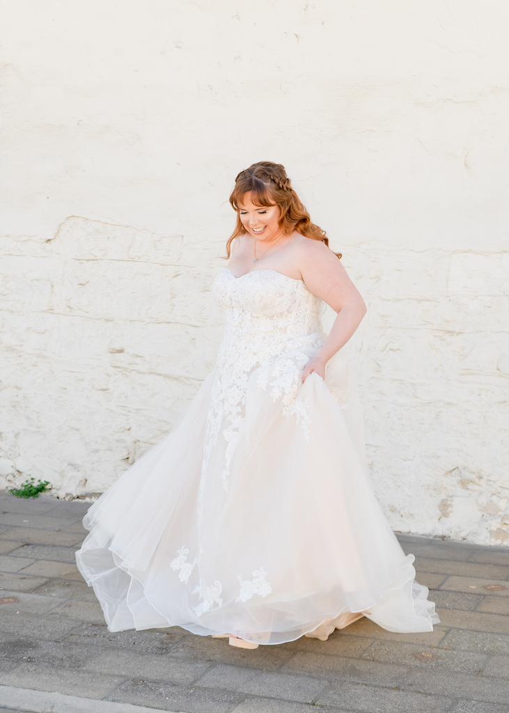 bride twirling at Spring Wedding in Monterey