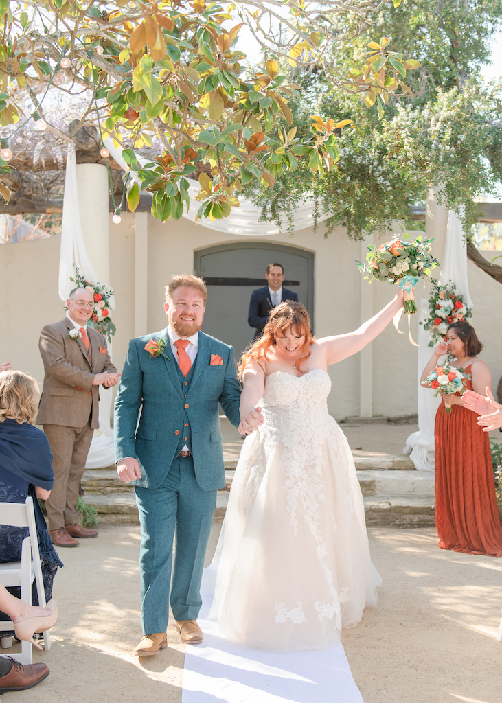 bride and groom walking down the aisle