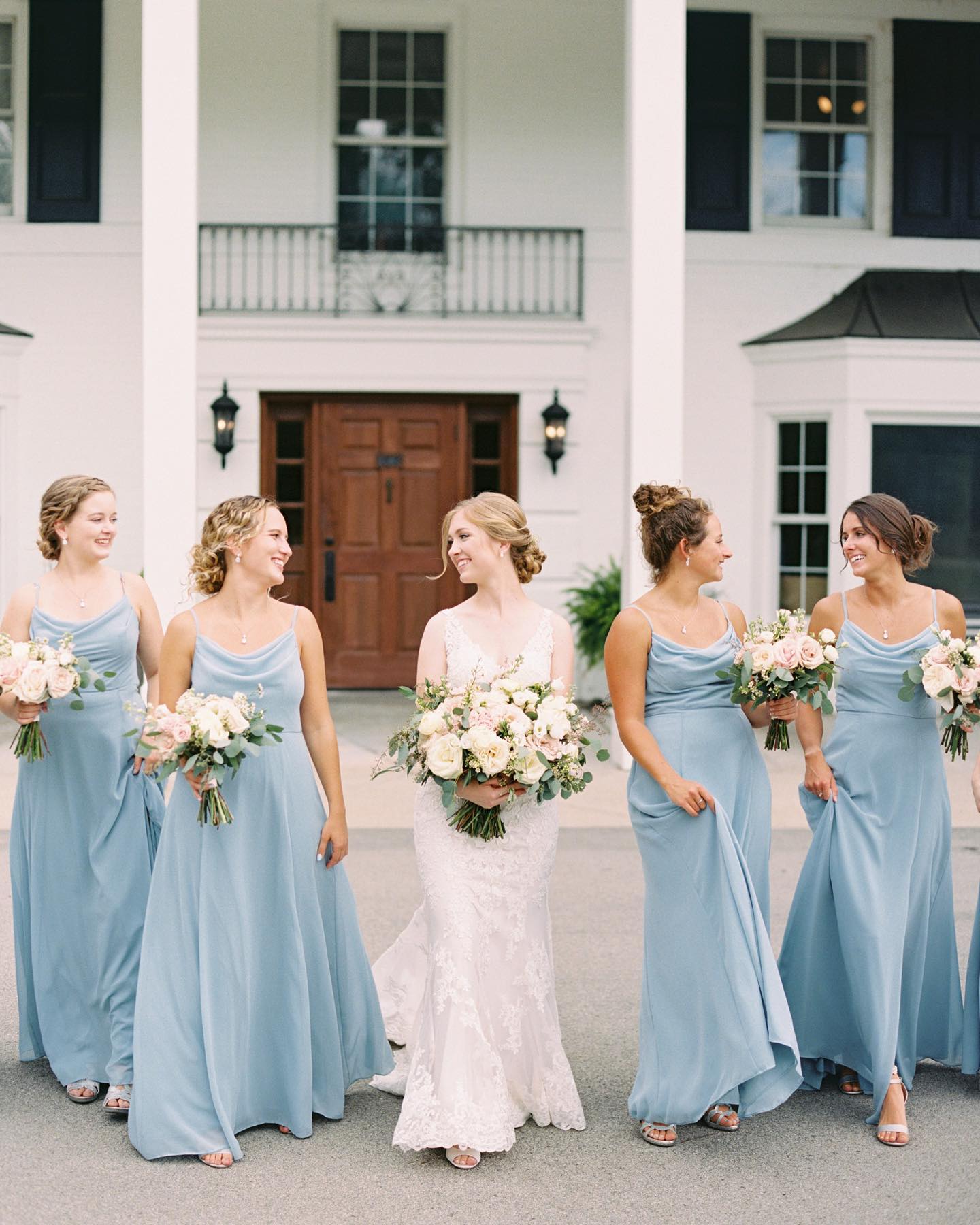 bride and bridesmaid walking