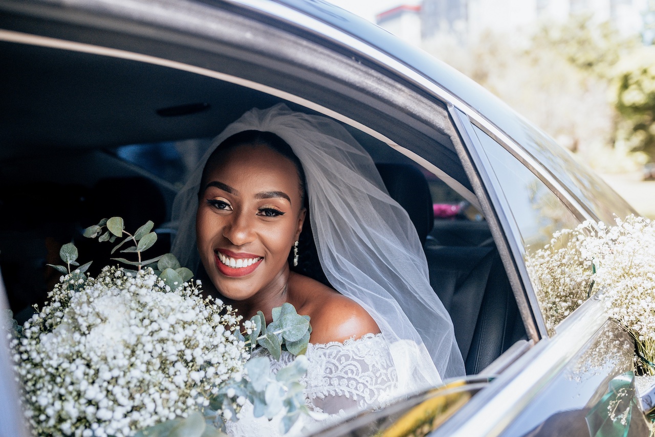 bride looking out car window