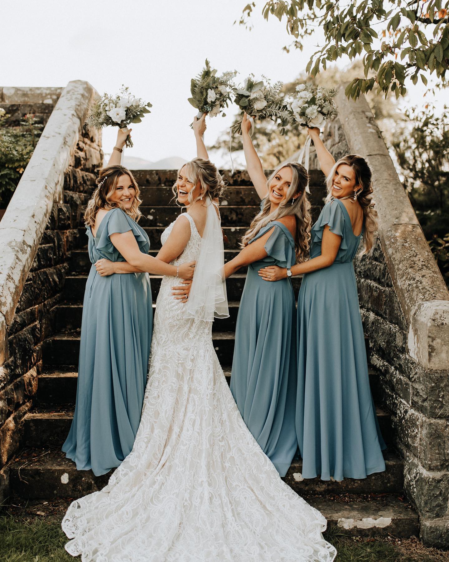 bridesmaids in steel blue dresses