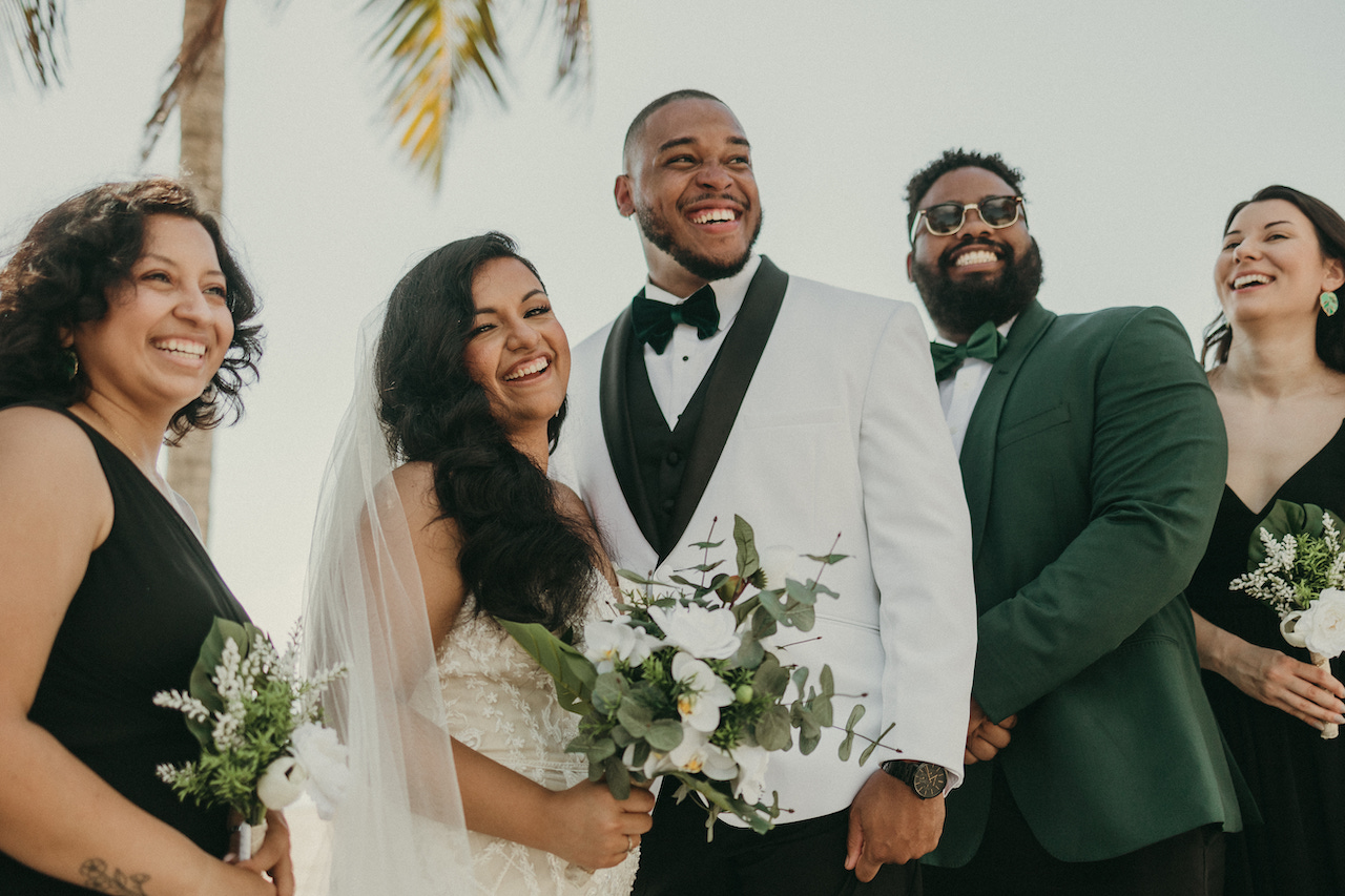 bride and groom smiling 