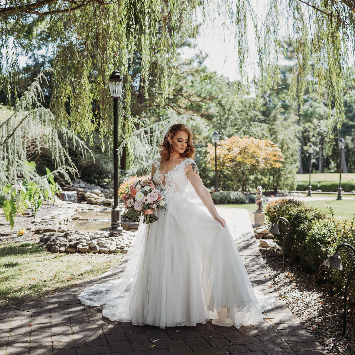 Illusion Cap Sleeve Lace Appliqued Wedding Dress - bride smiling 