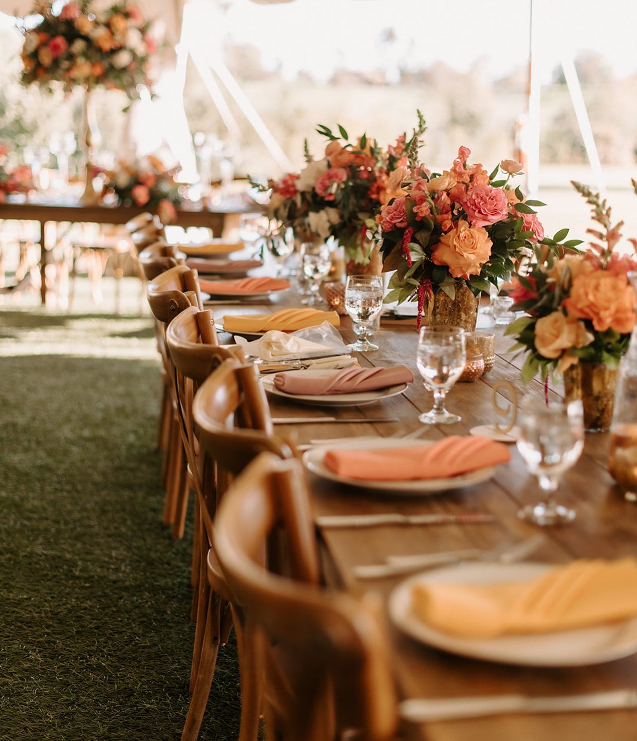pink and orange reception table setting