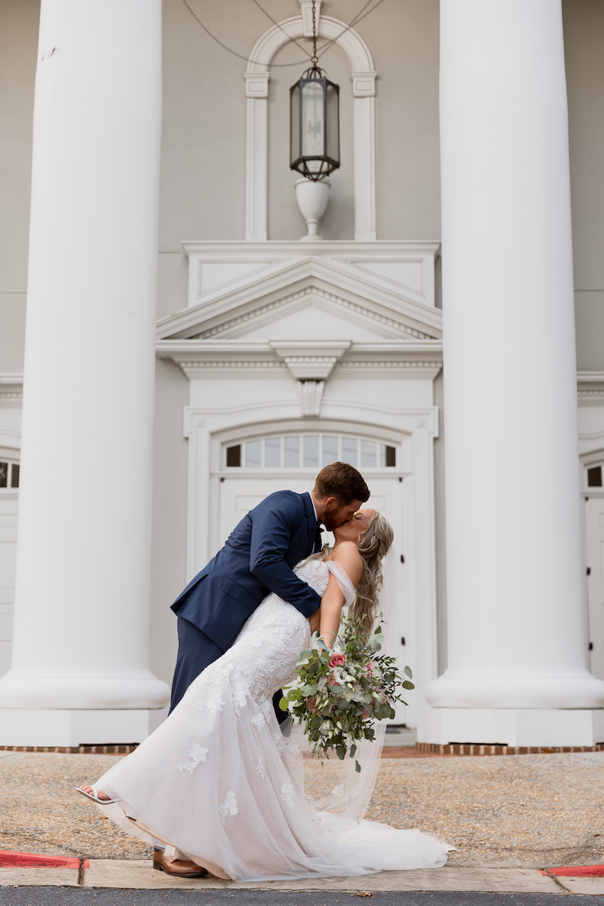 bride and groom kissing