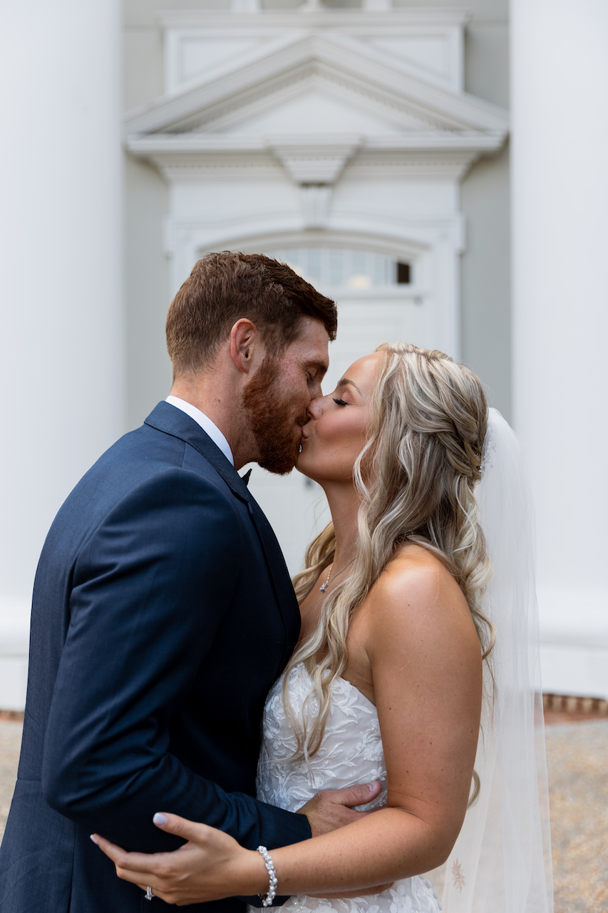 bride and groom kissing - summer wedding in Georgia 