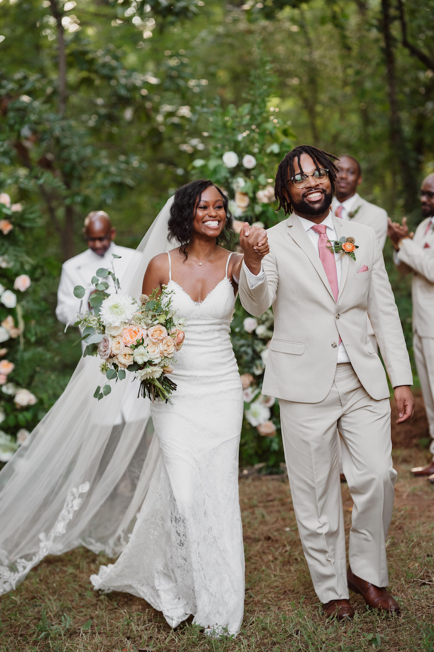 bride and groom walking down the aisle