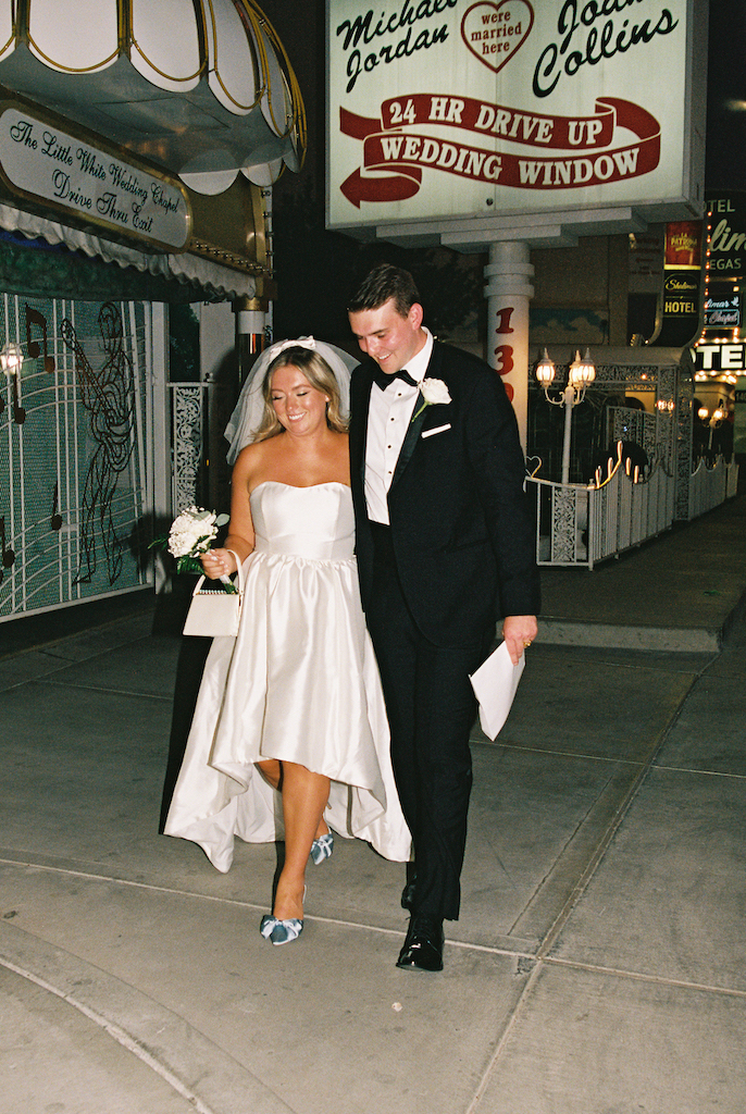 bride and groom walking in las vegas