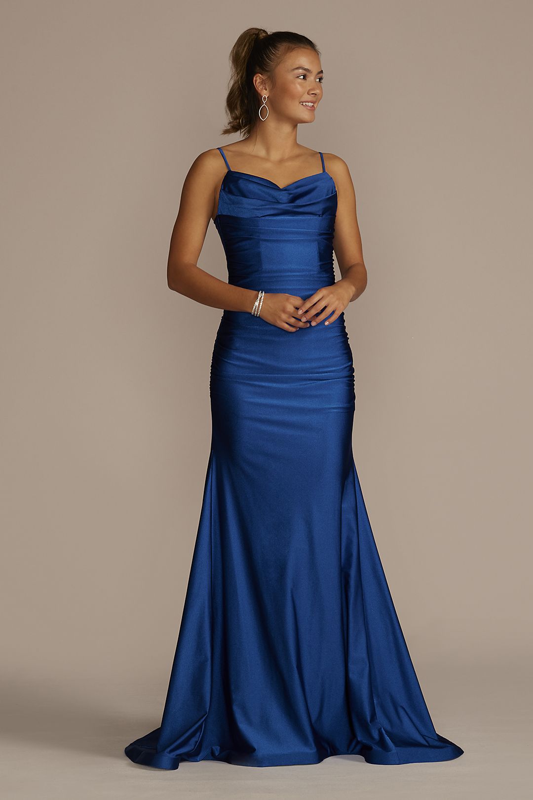 Girl in navy blue prom dress