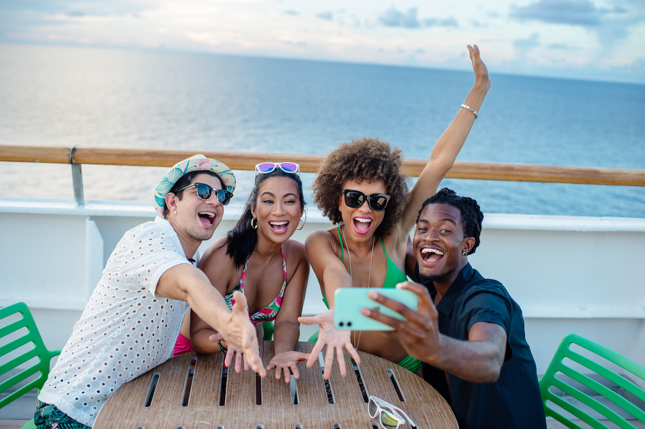 two couples taking a selfie